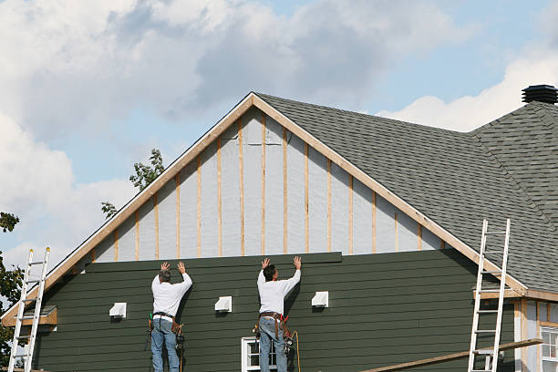 Professional Siding Installation technician working in Sedley, VA